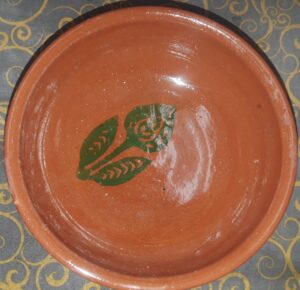 Micacious glaze - disguised in the colors of the fired pot.